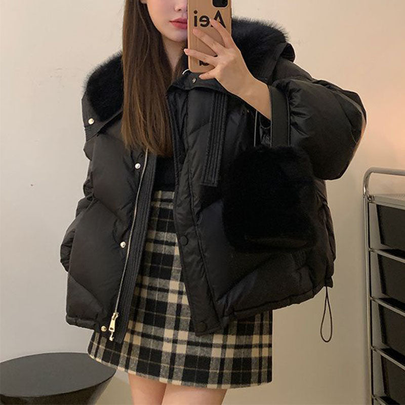 Haselnussbraune Pufferjacke aus Pelz